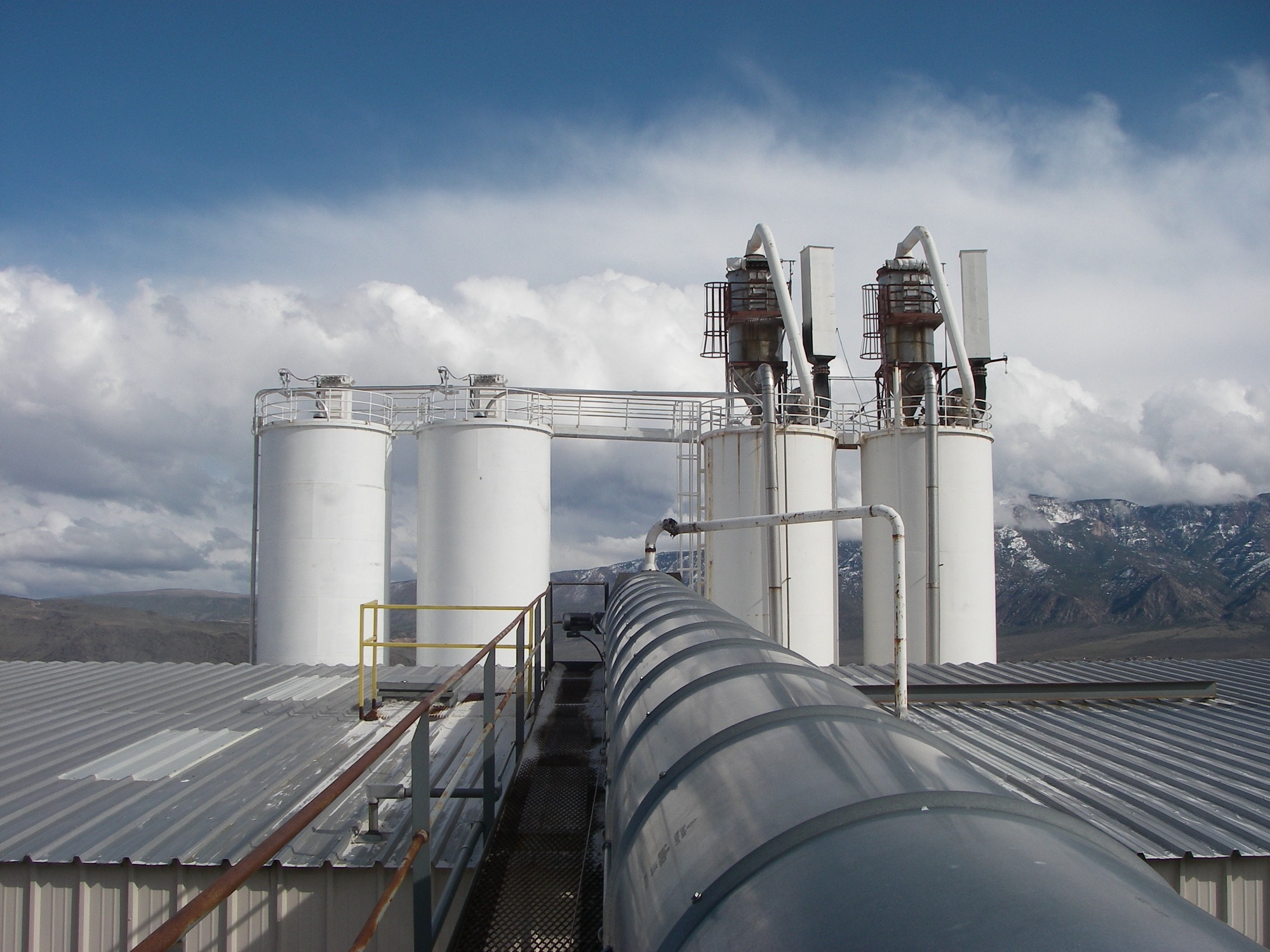 Mechanical conveyors—screw, belt, drag—and bucket elevator moving bulk solids
