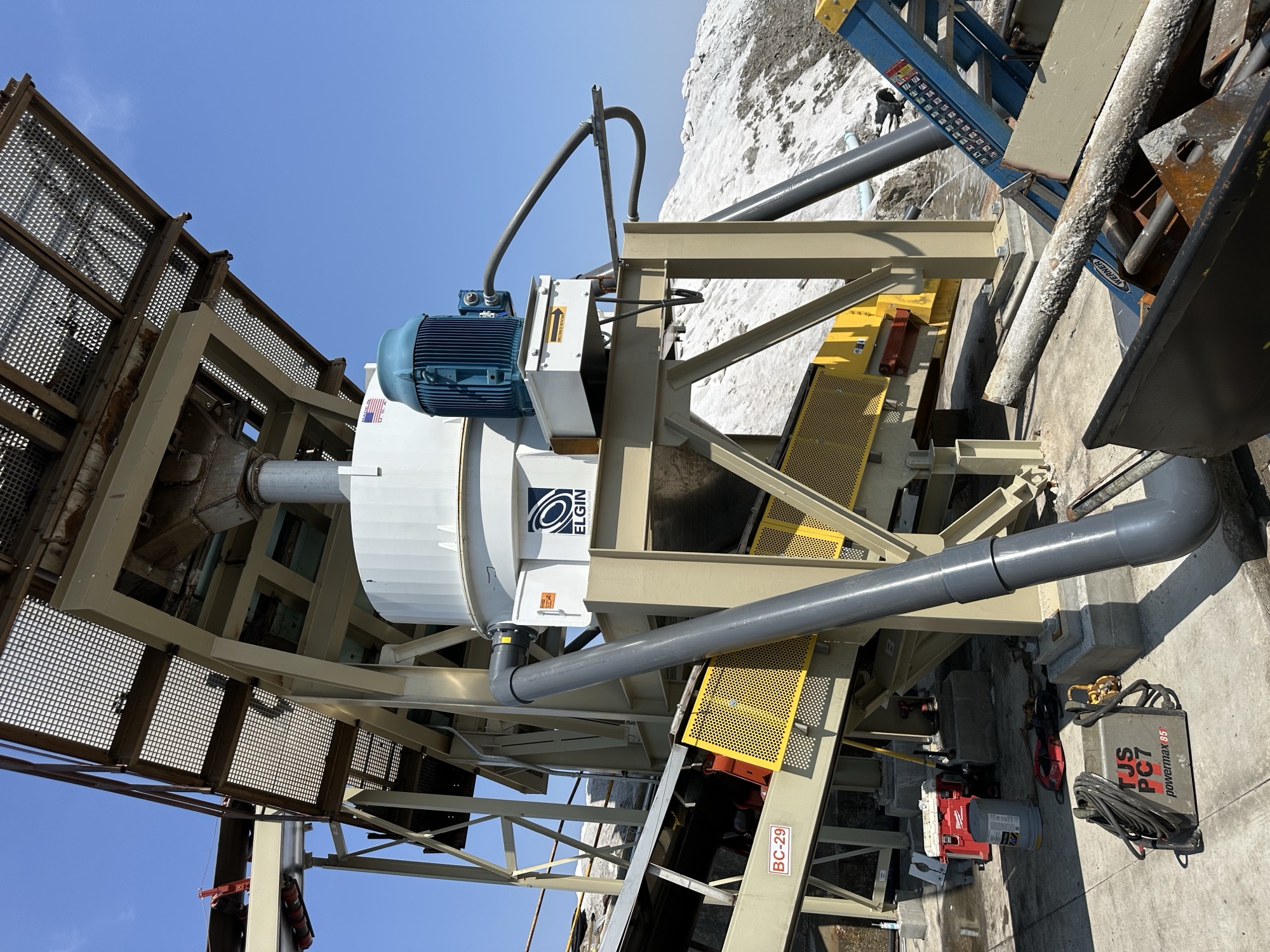 Dewatering and separation systems including centrifuges, air bed dryers and rotating kilns